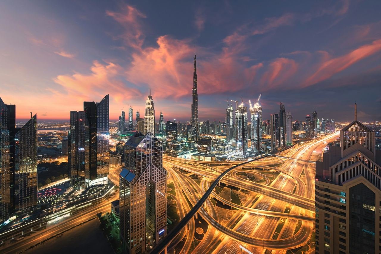 Sheikh Zayed Road interchanges and the Dubai skyline at golden hour