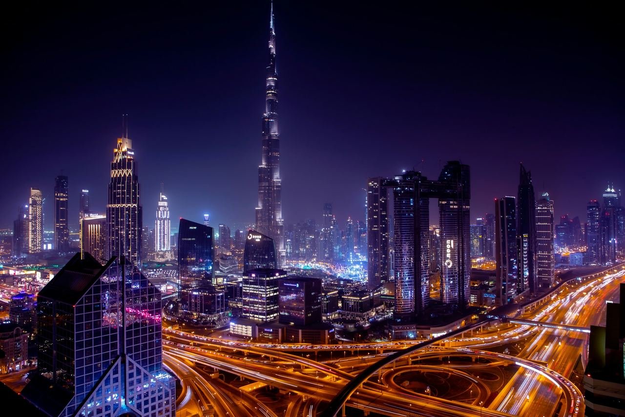 Dubai highway interchange lit up at night