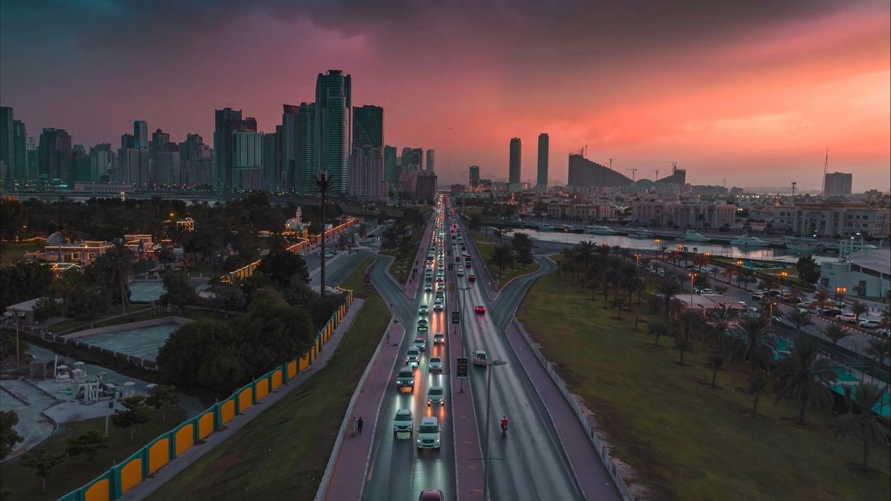 Commuter traffic on a Sharjah highway at dusk